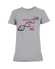 Patriotic Ladies T-Shirt featuring a red, white, and blue DNA helix with 'Patriotism It's in my DNA' text. Soft and stylish American pride apparel.